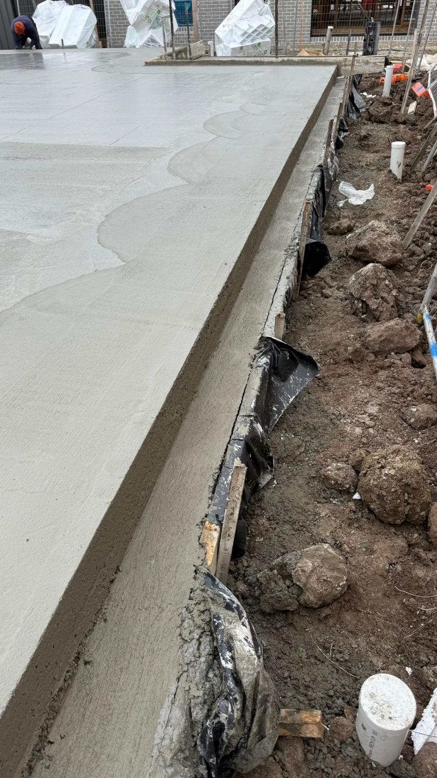 Close-up of a freshly finished slab edge with a clean, straight arris