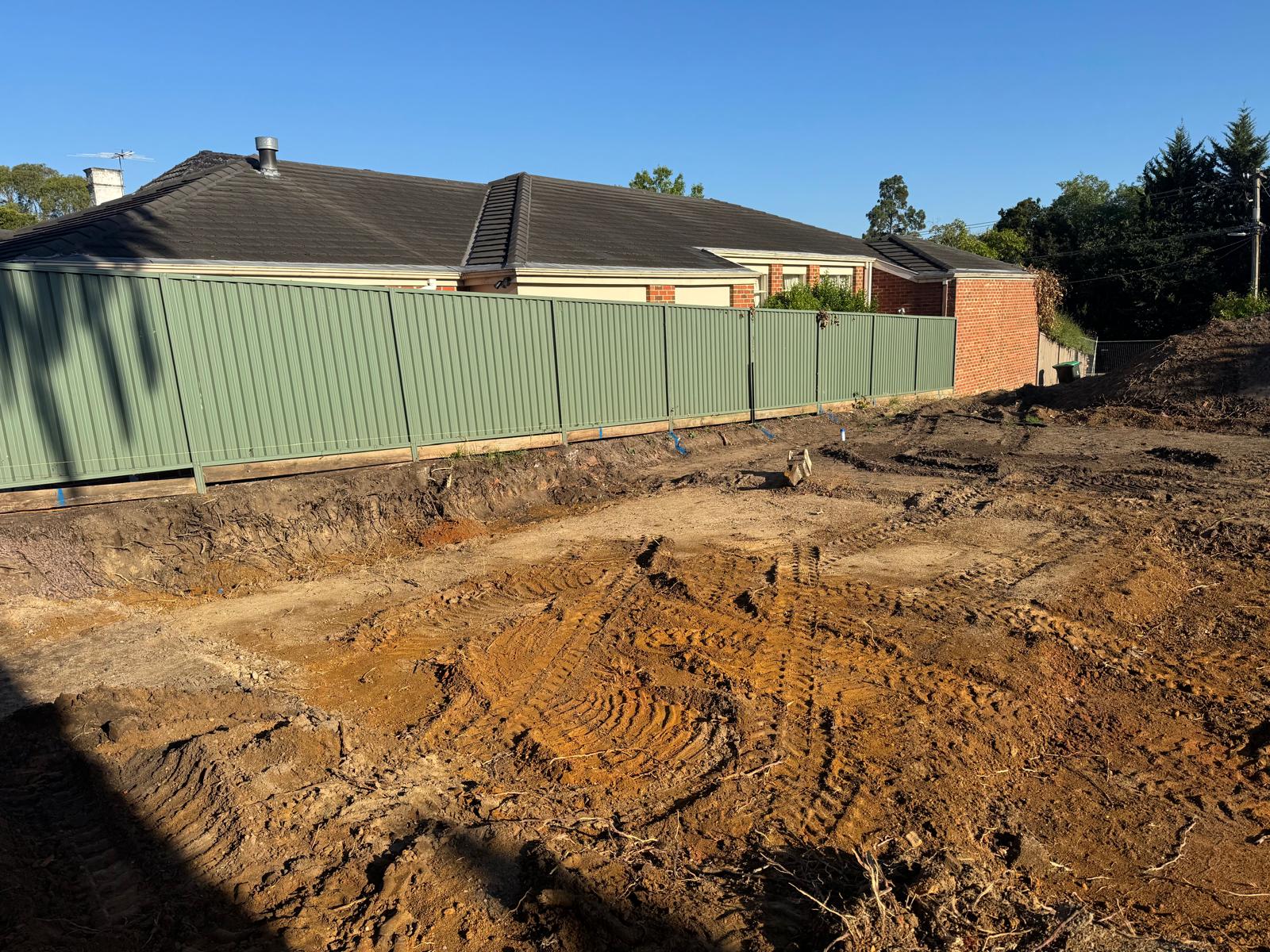 An excavated, levelled residential block ready for concrete work